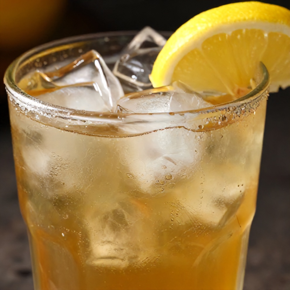 Glass of Refreshing Mint and Lemon Verbena Iced Tea with lemon slice